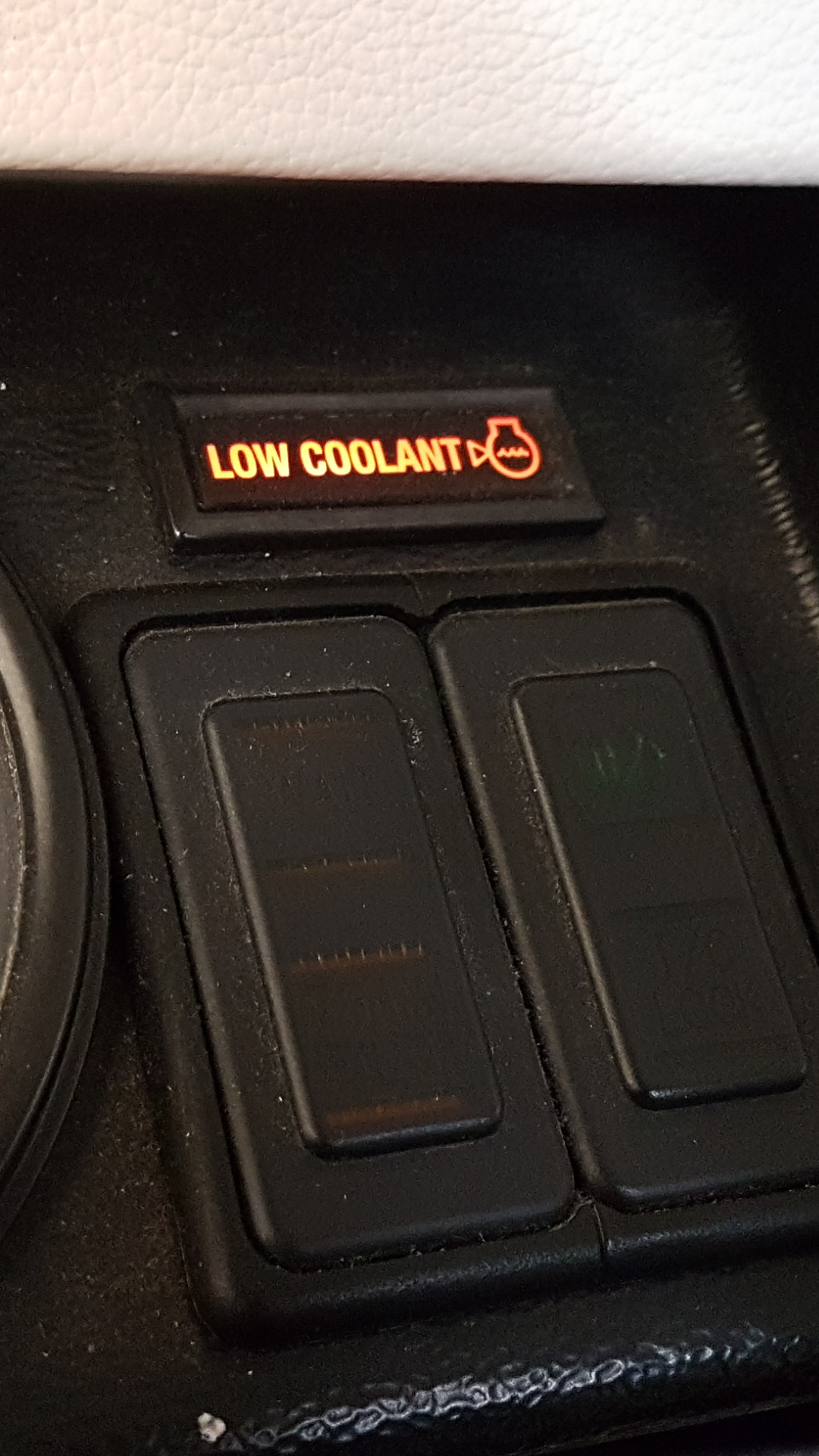 low coolant light blinks when car idle